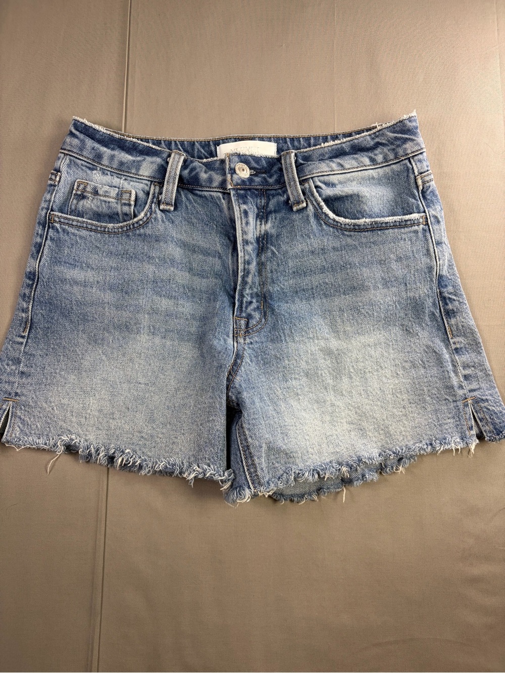 High-Rise Light Blue Denim Cutoff Shorts